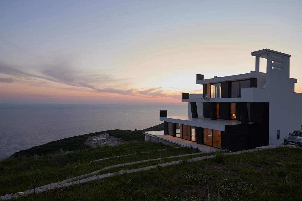 External view of a contemporary house modern villa at  sunset